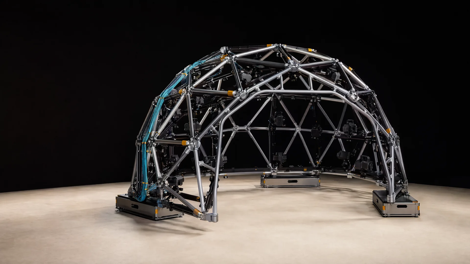 A portable surround array built to open, travel and return to shape. Representative StelMount structure